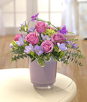 Eileen Jenkins Lilac/pink container arrangement